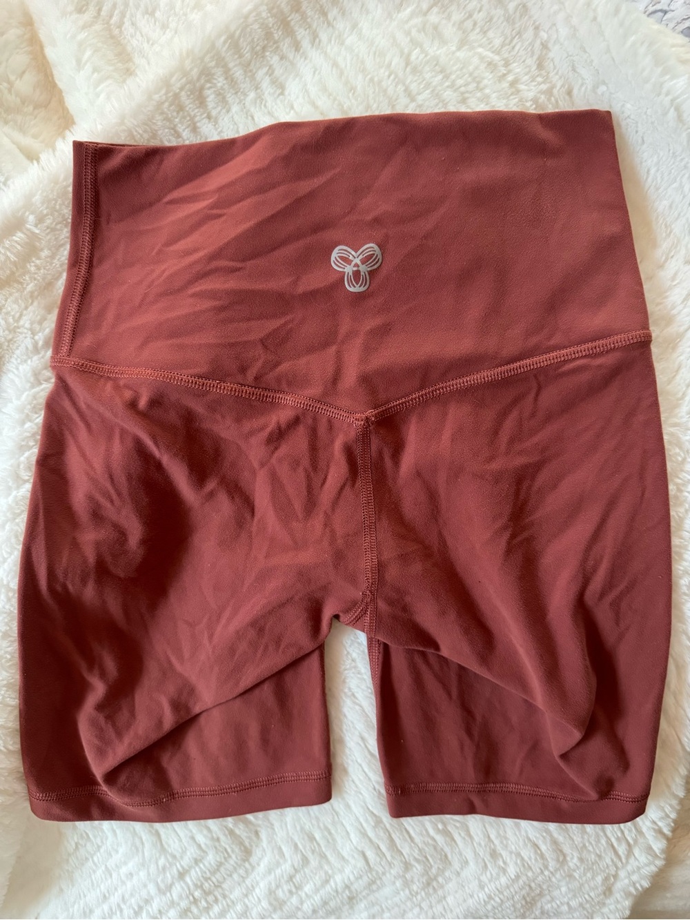 TNA Women’s High-rise Bike Shorts in Rust Pink/Red